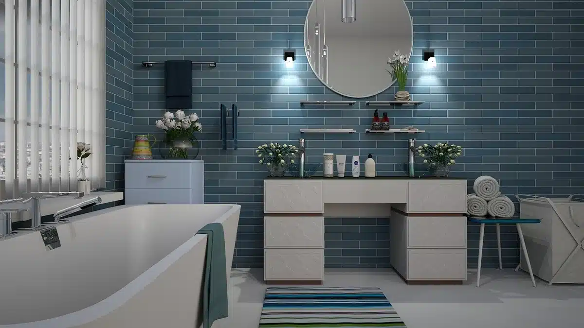 Termoarredo montato a bandiera in bagno stretto con mensola e lavabo